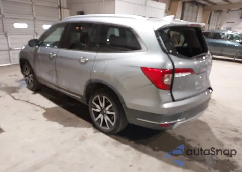 2020 Honda Pilot 2Wd Touring 7 Passenger from USA, damaged, VIN 5FNYF5H69LB010894